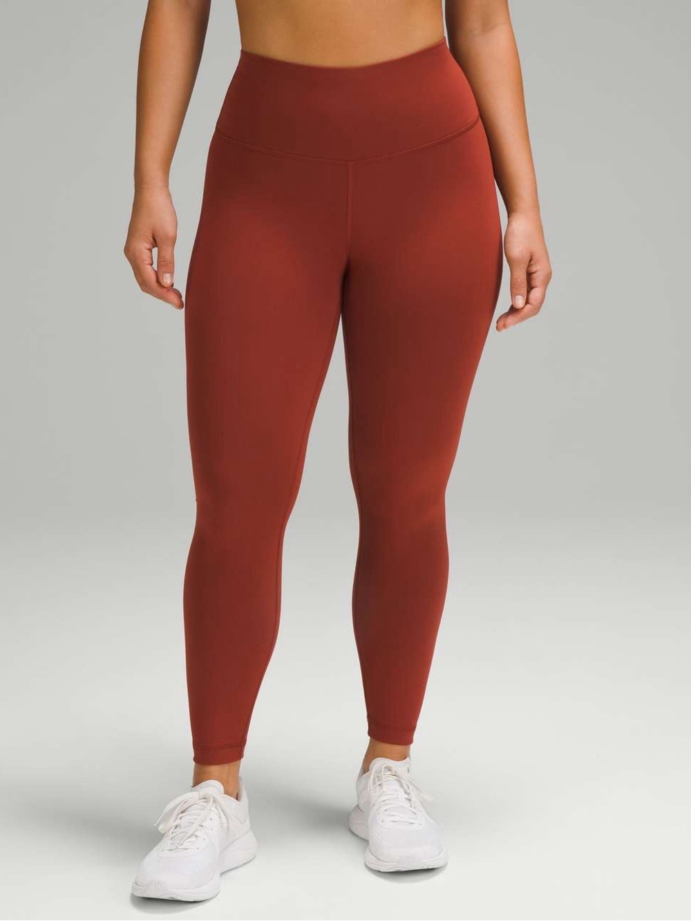 Lululemon Wunder Train Contour Fit High-Rise Tight 25" in Terra Orange